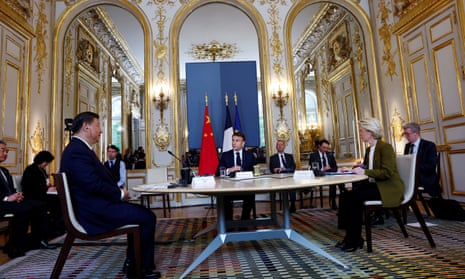 French President Emmanuel Macron speaks during a trilateral meeting with China’s President Xi Jinping and European Commission President Ursula von der Leyen at the Elysee Palace in Paris