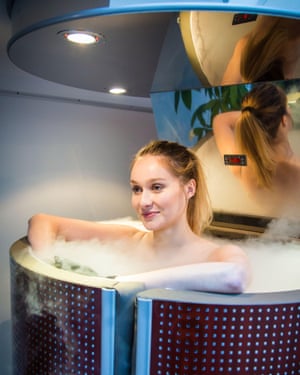 A woman in a cryotherap y chamber