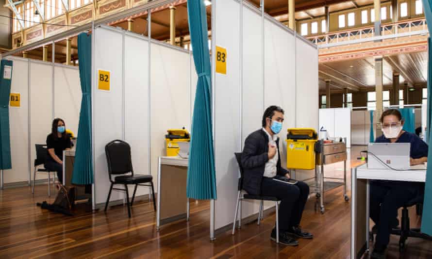 People getting their Covid vaccines at the Royal Exhibition building in Melbourne.