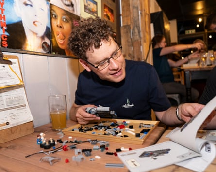 Adult Lego Fans gather at the Old London Road Cafe in Kingston. Tim Hirst working on his DeLorean Car Lego.