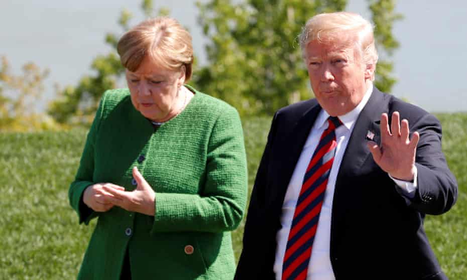 Germany’s Angela Merkel and Donald Trump at the G7 summit. ‘At the political level, the ties that bind us are under strain.’