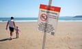 a pollution warning sign at Scarborough beach, north Yorkshire