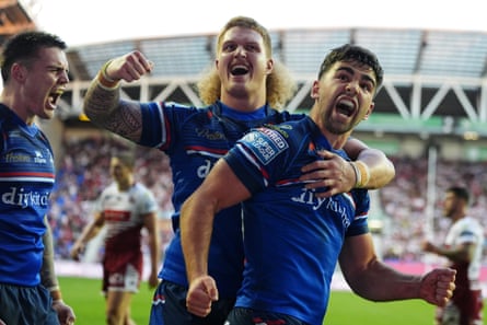 Wakefield's Jack Sinfield celebrates scoring a try against Wigan