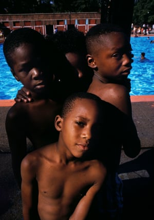 Four boys on the poolside at Jefferson Pool