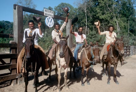 Four men on horseback at the VW ranch. 