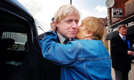 Boris Johnson receives a kiss during a London mayoral campaign walkabout in Chingford east London, in April 2008.