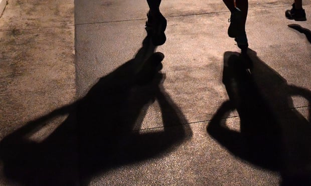 Shadows of group of people jogging