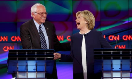 Clinton shakes hands with rival candidate Bernie Sanders
