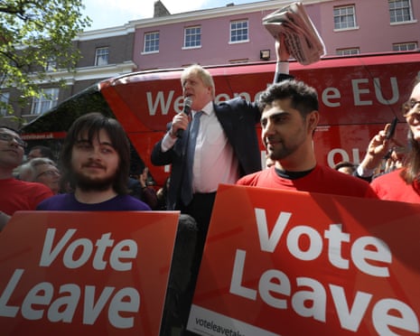 Boris Johnson delivers a speech surrounded by Vote Leave campaigners.