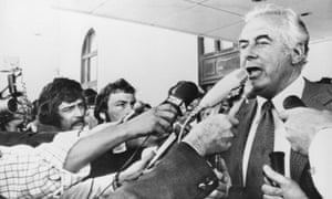 Prime Minister Gough Whitlam addresses reporters outside the Parliament building in Canberra after his dismissal by Australia's governor general in November 1975.