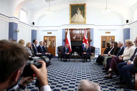 Donald Tusk (centre left) and Keir Starmer (centre right) holding a meeting at the Royal Air Force (RAF) base in Northolt, near London.