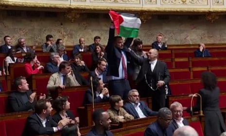 French MP Sébastien Delogu interrupts a junior minister's statement on Gaza by waving the Palestinian flag in response to Israel's latest deadly bombardment  