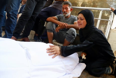 Funeral of Palestinians killed in Israeli fire while seeking aid on Wednesday, in Gaza City.