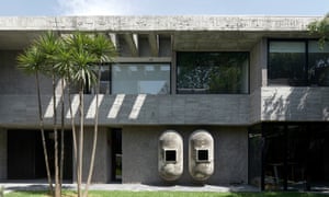 A view of the concrete house from the garden.