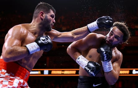 Filip Hrgovic punches Moses Itauma during their IBF world heavyweight world title fight.