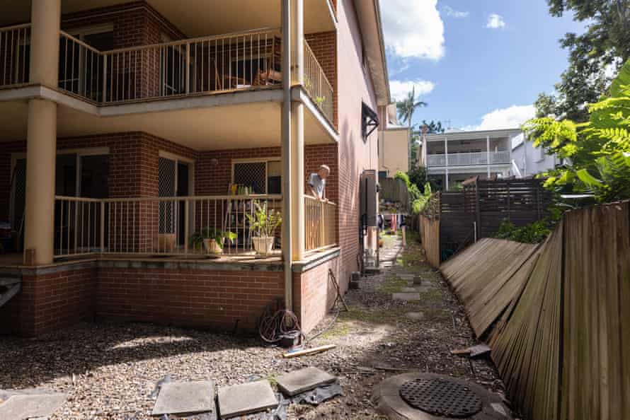 Kevin Adams on the balcony of his ground-floor unit
