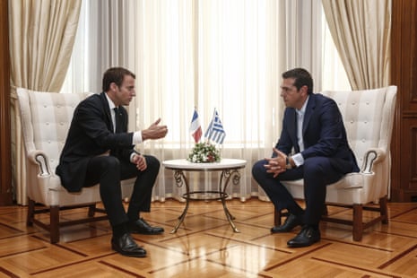 Greek Prime Minister Alexis Tsipras, right, and French President Emmanuel Macron speaking today.