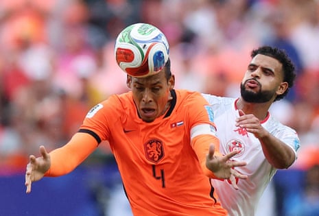 Virgil van Dijk in action with Tunisia's Anis Slimane