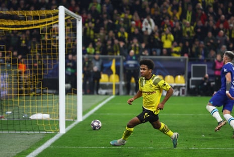 Borussia Dortmund's Karim Adeyemi scores their first goal past Chelsea's Kepa Arrizabalaga