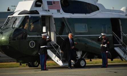 Trump steps off Marine One on his way to board Air Force One at Andrews Air Force base on Thursday
