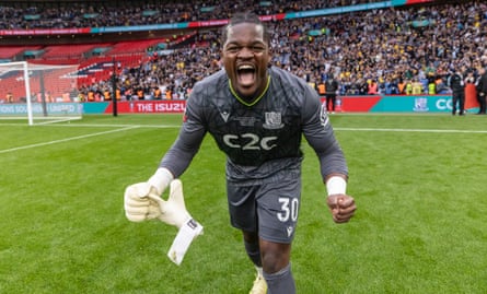 Southend's goalkeeper Collin Andeng-Ndi enjoys the victory after saving two penalties in the shooutout.