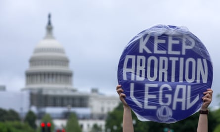 Abortion rights demonstrators gather near the Washington Monument during a nationwide rally in support of abortion rights in Washington DC on Saturday.
