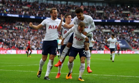 The Tottenham players celebrate Christian Eriksen’s match-winning goal at Wembley.