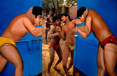 Through the doors of a wrestling school, Delhi 1989Wrestlers through a painted gate, in the Delhi, neighbourhood of Paharganj
