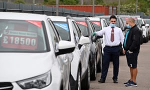 The forecourt of a recently re-opened Vauxhall car dealership in north London last month