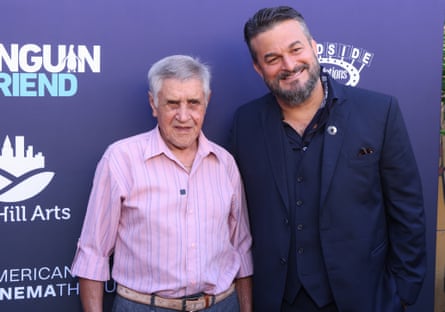 João Pereira de Souza and David Schurmann. Retired fisher Seu João formed a friendship with the penguin that lasted five years.