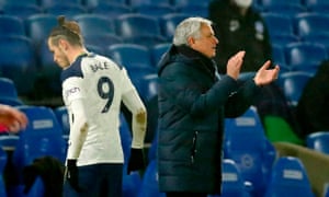 Tottenham Hotspur's Portuguese head coach Jose Mourinho gestures on the touchline as  Welsh striker Gareth Bale leaves the game.