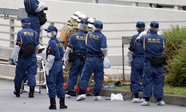 Police officers investigate the site near Japanese prime minster Fumio Kishida’s official residence where a man protesting a state funeral for Shinzo Abe set himself on fire.