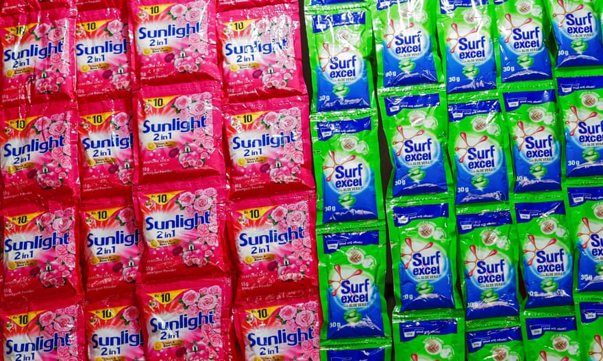 Brightly colored pouches of Sunlight and Surf detergents.