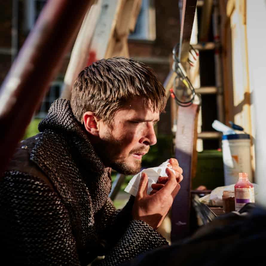 Ronnie York works his make-up backstage. All the actors are responsible for their own make-up, using a small mirror backstage for applications, touch-ups and removals.