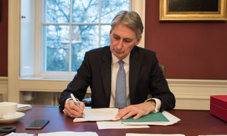 Philip Hammond puts the finishing touches on his autumn statement at No 11 Downing Street.