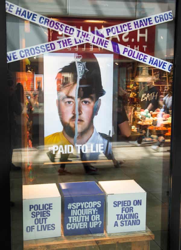 The ‘spy cops’ campaign material in the window of Lush’s Cambridge shop