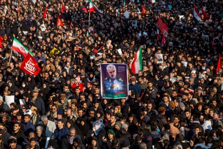 Mourners attend a funeral ceremony of Iranian Maj Gen Qassem Suleimani and others who were killed in Iraq by a US drone strike on 6 January 2020 in Tehran.