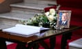 A book of condolence and a portrait of Giorgio Napolitano at the senate in Rome where his coffin lay in state on 24 September 2023.