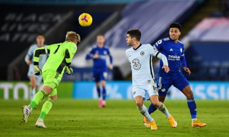 Leicester keeper Kasper Schmeichel heads clear.