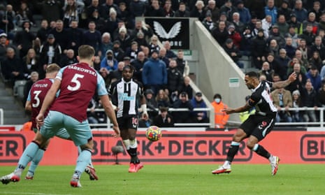 Newcastle United’s Callum Wilson scores their first goal.