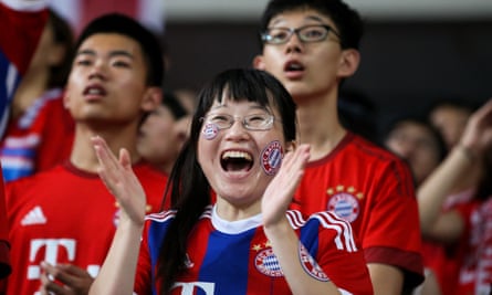 Chinese fans of Bayern Munich cheer for the team before a pre-season friendly against Internazionale in Shanghai in July.