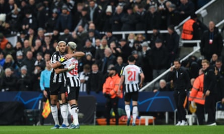 Joelinton is congratulated by Bruno Guimarães after giving Newcastle hope