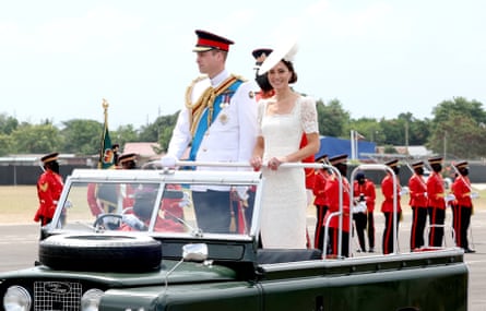 William and Kate in an open-top vehicle