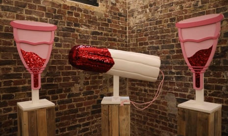 Models of a pair of menstrual cups and a tampon