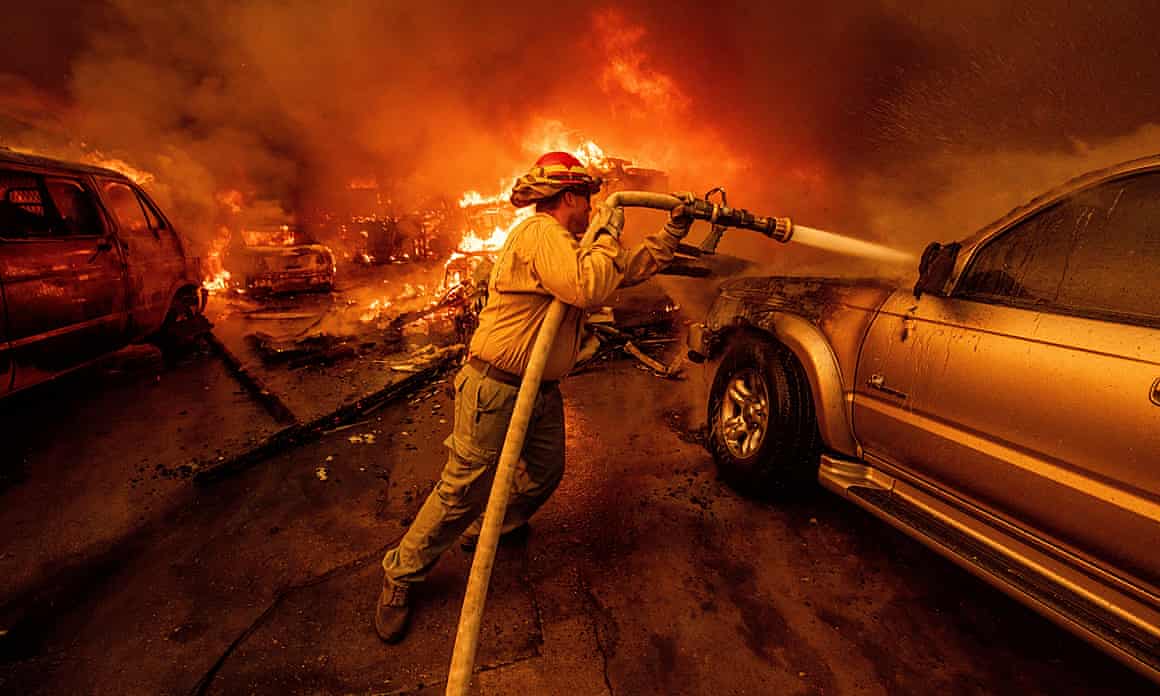 A firefighter battles the Eaton fire in Altadena, California, on Wednesday.