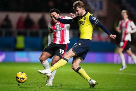 Oxford’s Stan Mills fires home his side’s winner