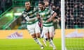 Celtic’s Greg Taylor (right) celebrates with Adam Idah after scoring his side's fifth goal of the game