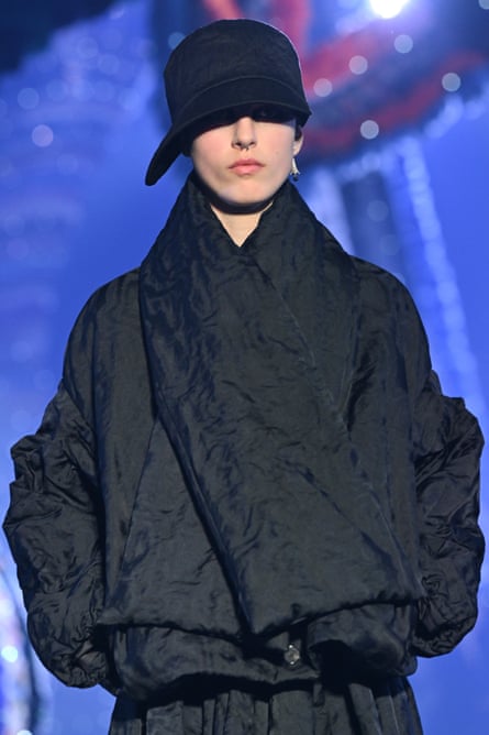 Black cloche on a model on the catwalk