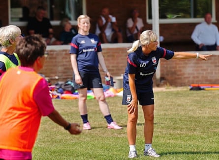 Gemma Darvill, the head coach of the England women’s Parkinson’s team, gesticulates to emphasise a point during a training session