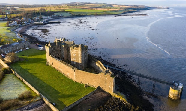 Aerial view of Blackness Castle ( setting for Outlander ) beside Firth of Forth river in West Lothian Scotland, UK